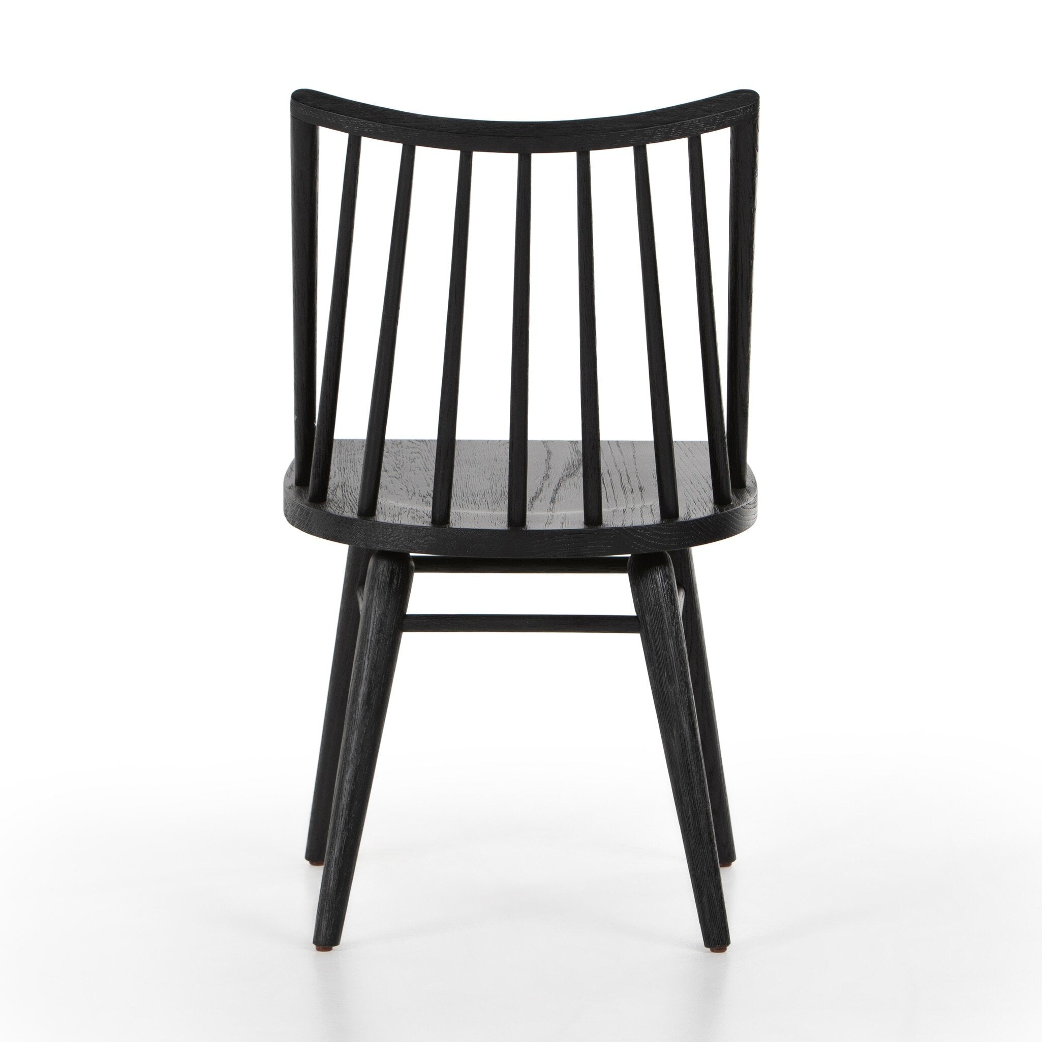 Black armless dining chair front view with vertical slat back, dark wood seat, four tapered legs