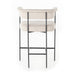 Upholstered counter stool with light camel fabric seat and back pad; black metal legs