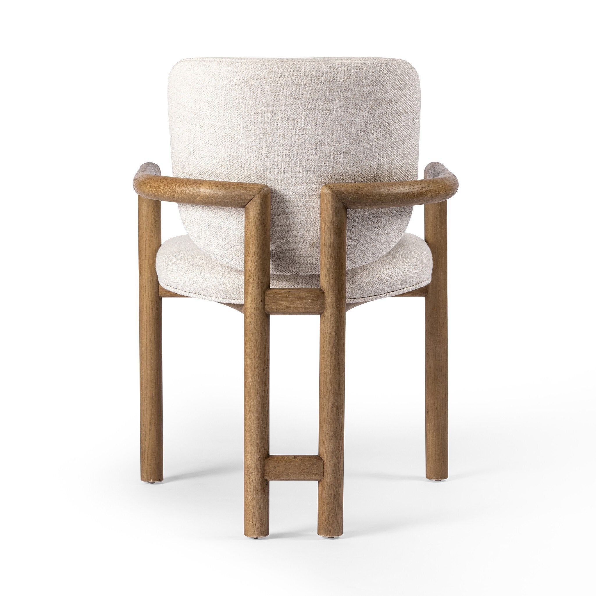 Back Madeira three-legged dining chair featuring a tubular frame and a curved barrel backrest in cream upholstery