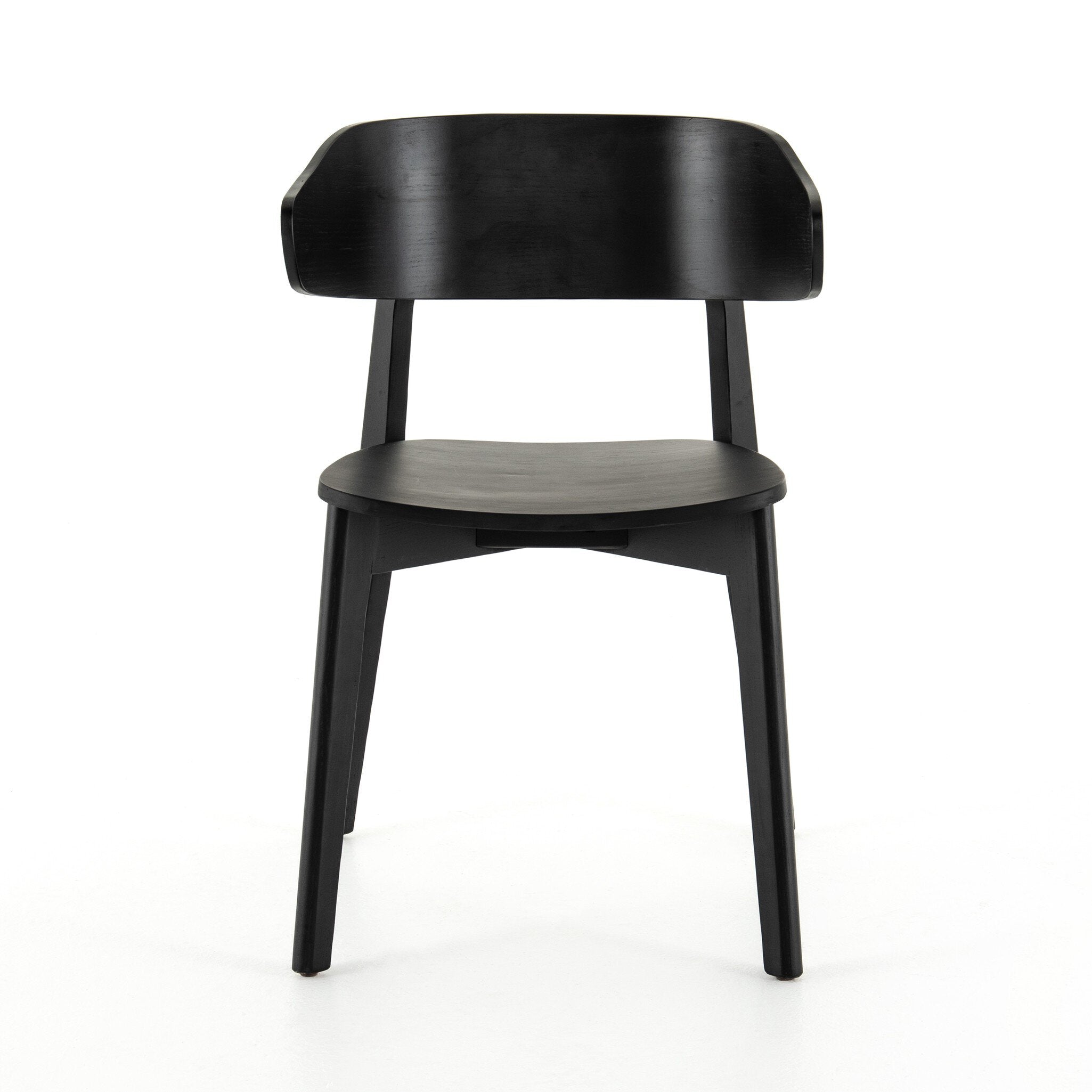Black armless dining chair with curved backrest, round seat, and tapered legs