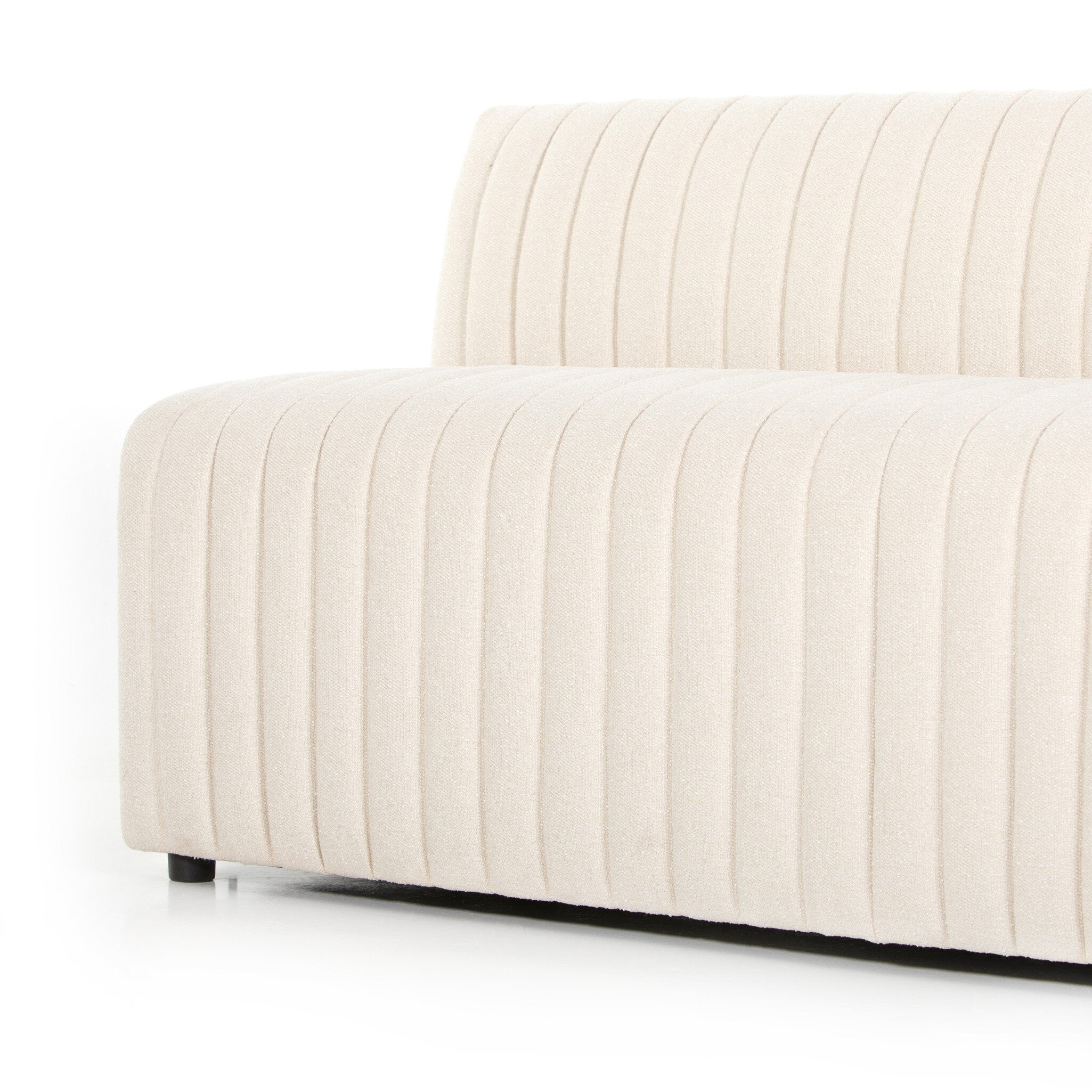 Bottom detail Custom Augustine dining banquette in neutral performance fabric with high-back tufted detailing and wood base.