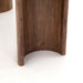 Bottom leg base Paden Dining Table in Seasoned Brown Acacia with crescent-shaped legs and an oval tabletop