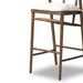 Brown wooden bar stool with cream padded seat and open back frame