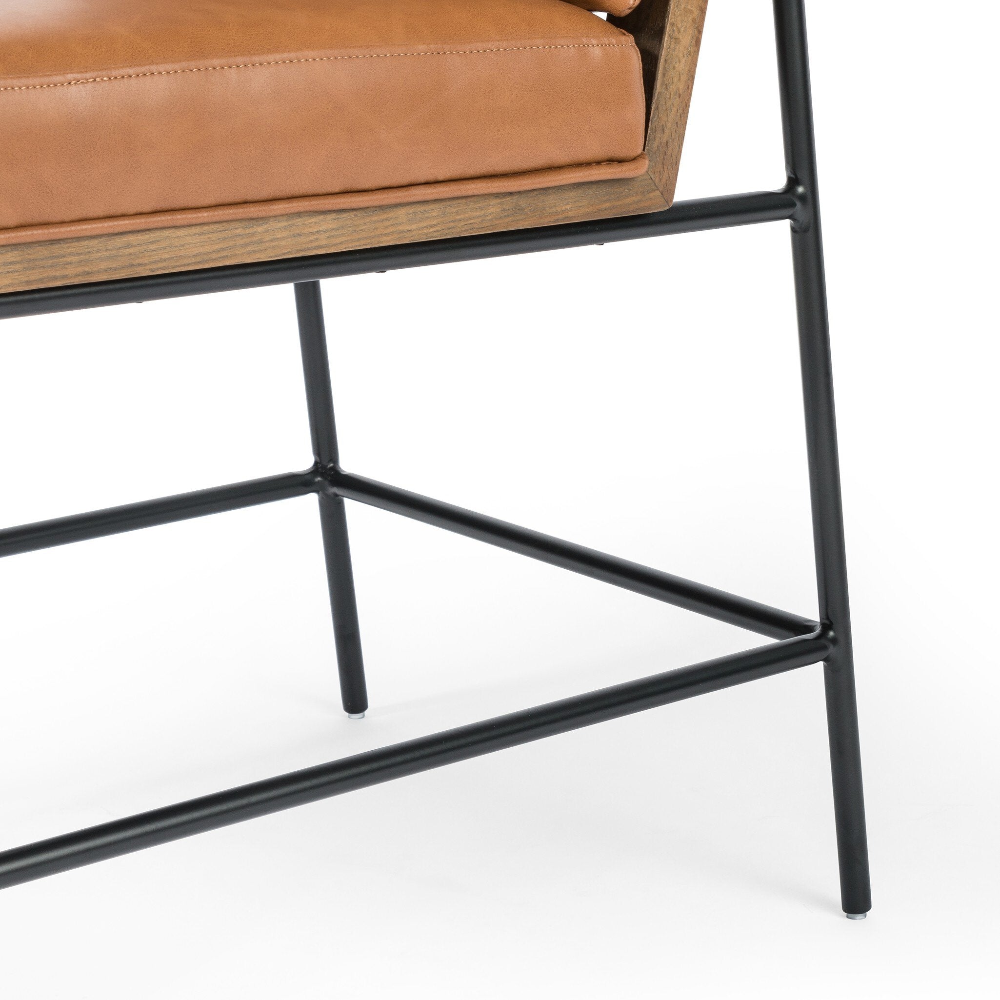 Bottom legs detail Crete Dining Chair with amber oak ladderback, black iron frame, and Sierra Butterscotch seat