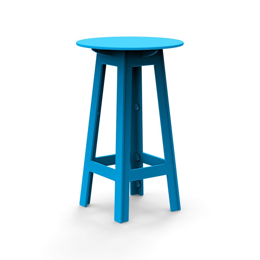 Blue round bar table with angled legs and open-frame cutouts