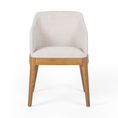 Bryce Dining Chair in light honey solid nettlewood with high-performance upholstered seat, transitional hospitality seating