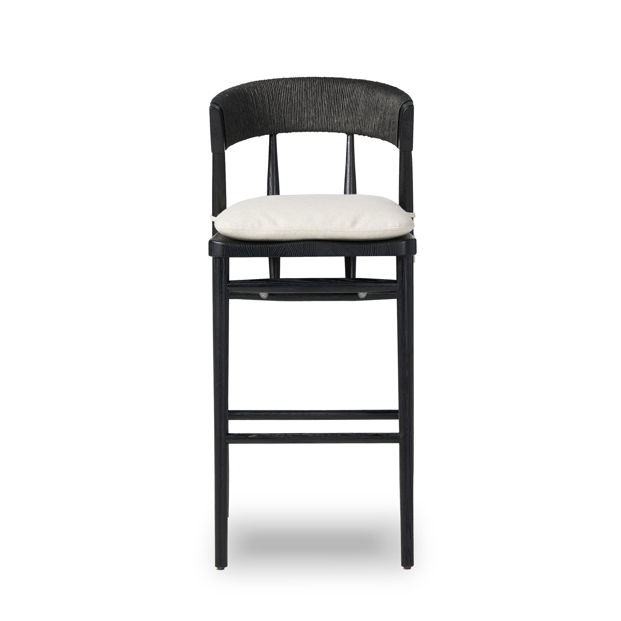 Bar stool with rounded black upholstered back and cream seat cushion