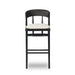 Bar stool with rounded black upholstered back and cream seat cushion