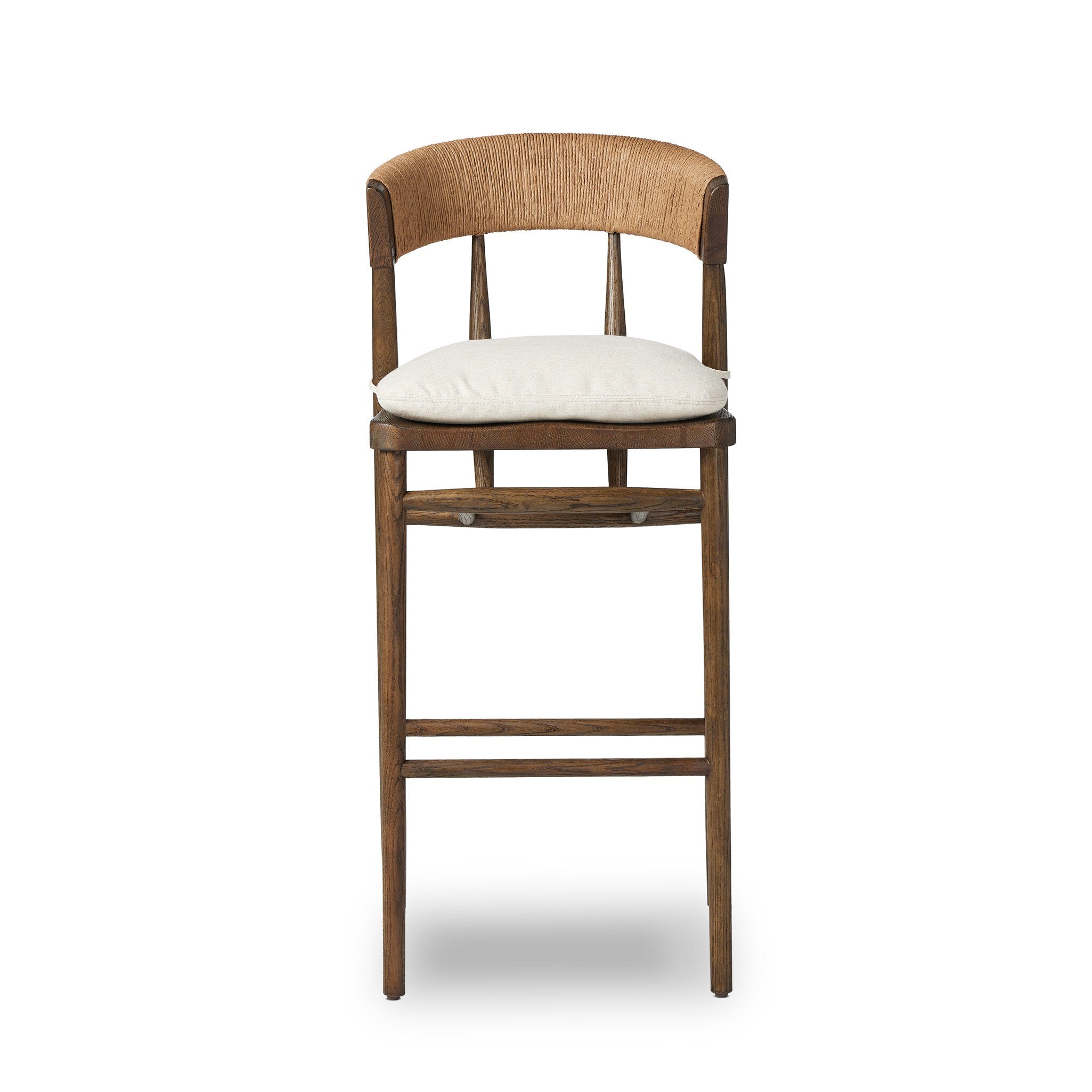 Brown wood bar stool with rounded woven back and light upholstered seat