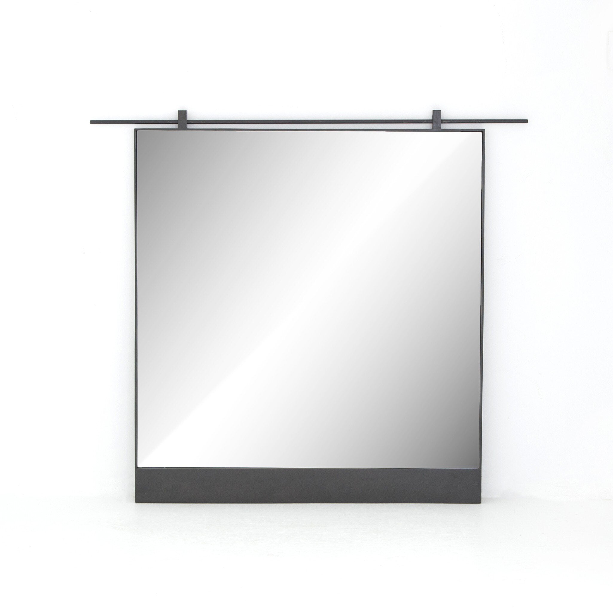 Chico square wall mirror featuring a unique vertical suspension bar in a hand-applied antiqued iron finish