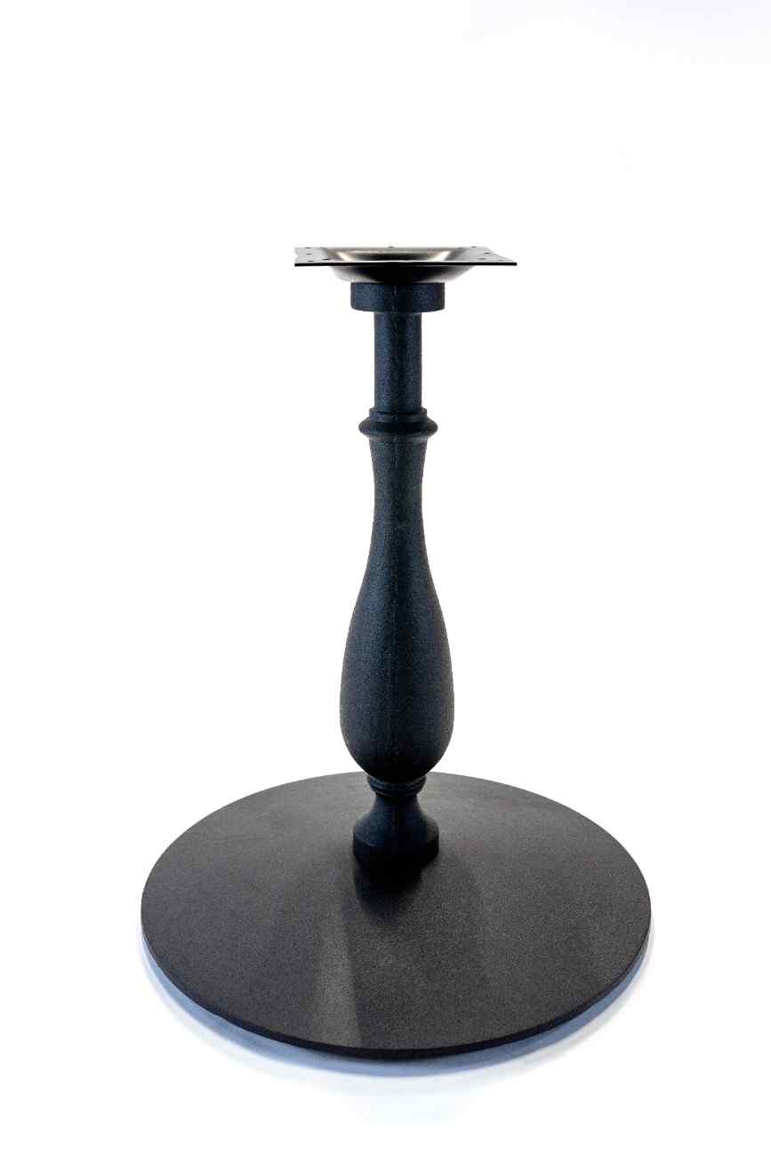 Close-up Circular black metal base with detailing on a white background