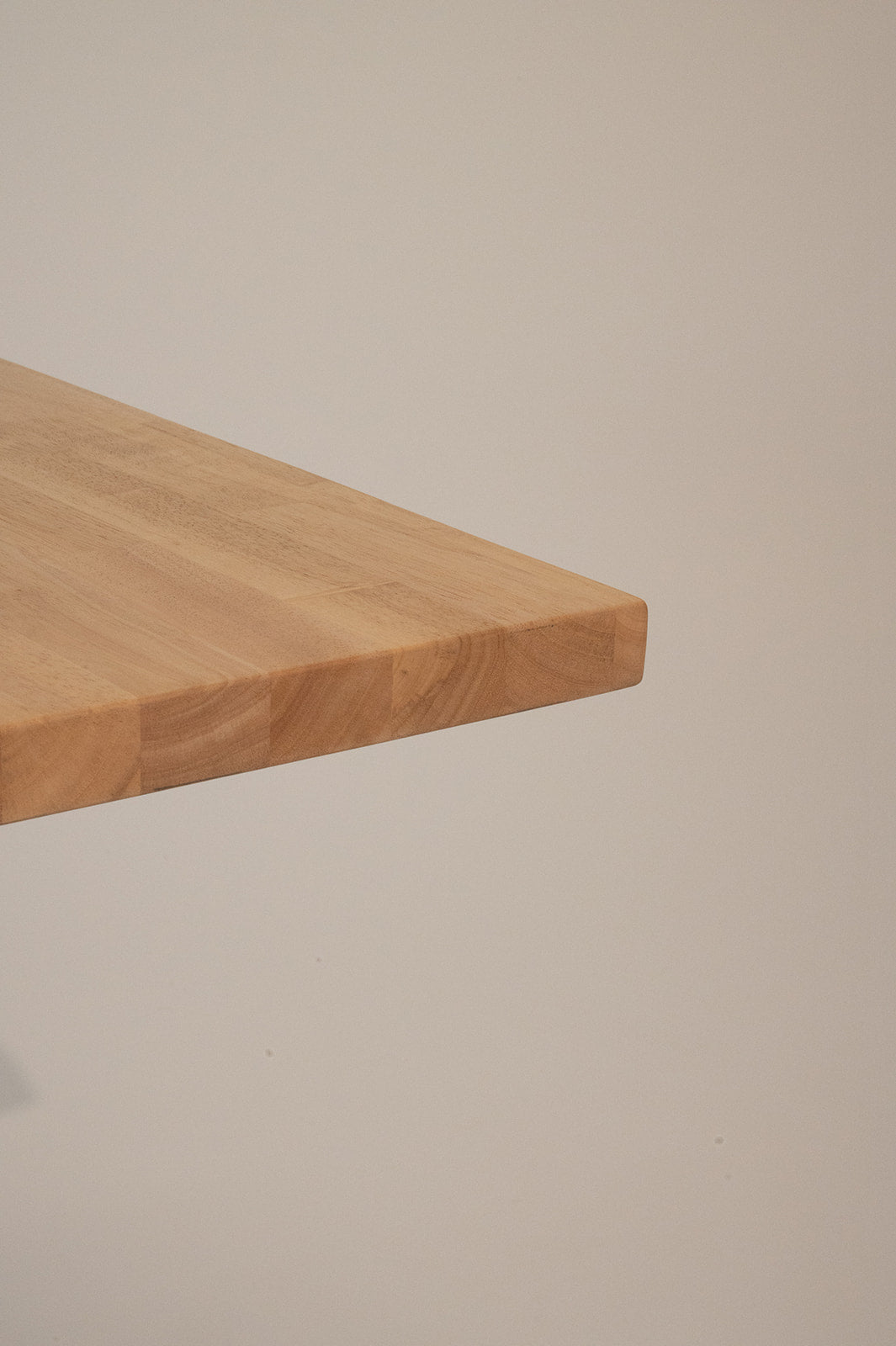 Close-up Corner Modern whitewash butcher block table top in a coastal-inspired café with contract-grade wood construction