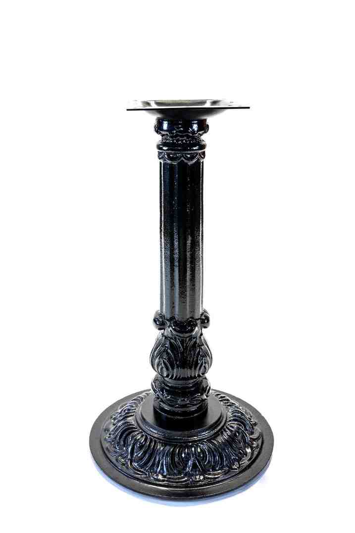 Close-up Decorative metal pedestal base on a white background