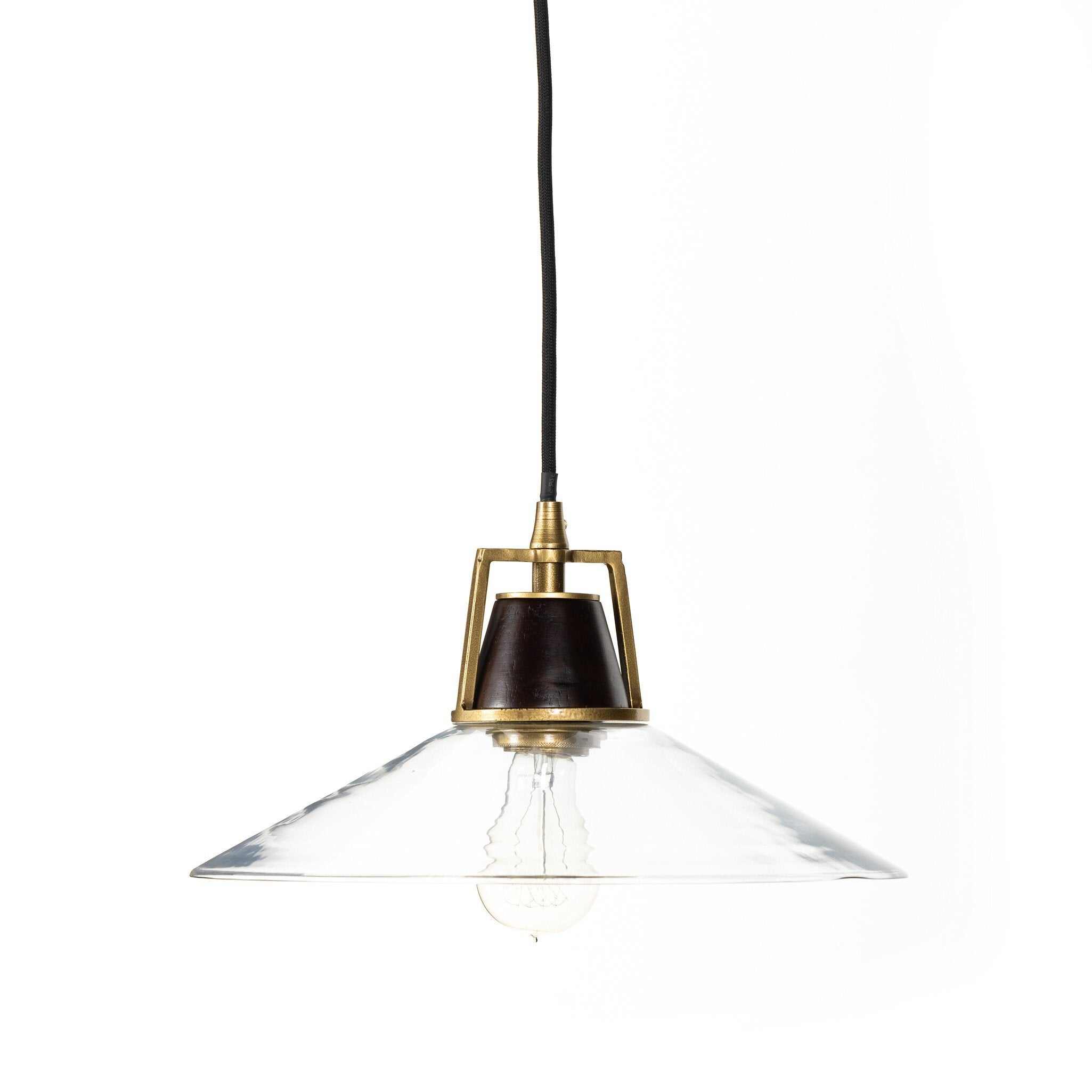 Close-up Novak 10-inch hand-hammered antique brass pendant light with clear glass detail 