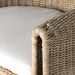 Close-up Tucson Outdoor Dining Chair with woven wicker frame and Stinson White cushions