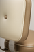 Close-up Tufted square retro modern bar stool featuring performance upholstery seat and buttons with silver metal stand