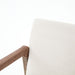 Close-up corner Reuben Dining Chair with oak frame, leather-wrapped arms, and natural linen seat