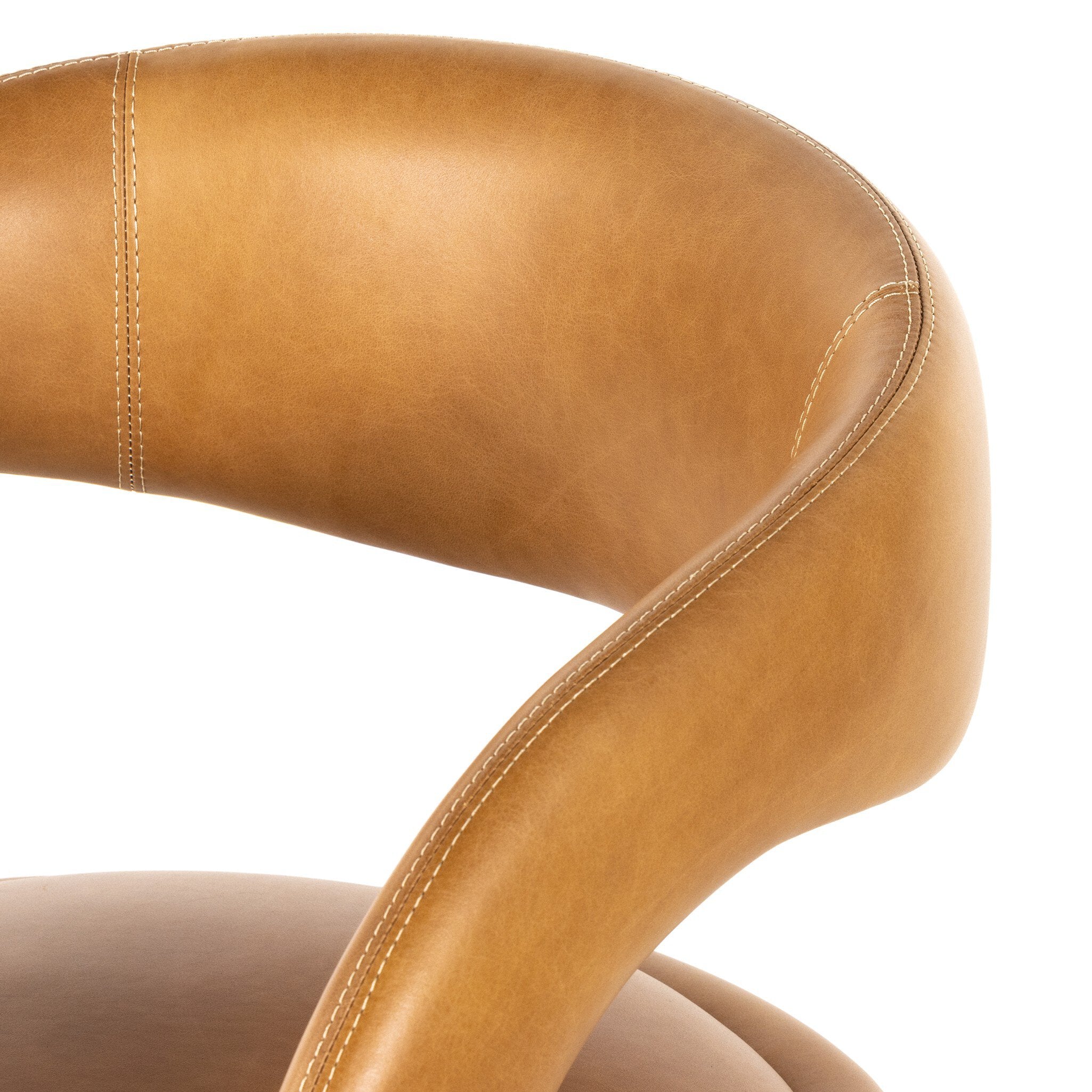 Counter stool close-up of tan upholstered arm and stitched edge with curved contour padding.