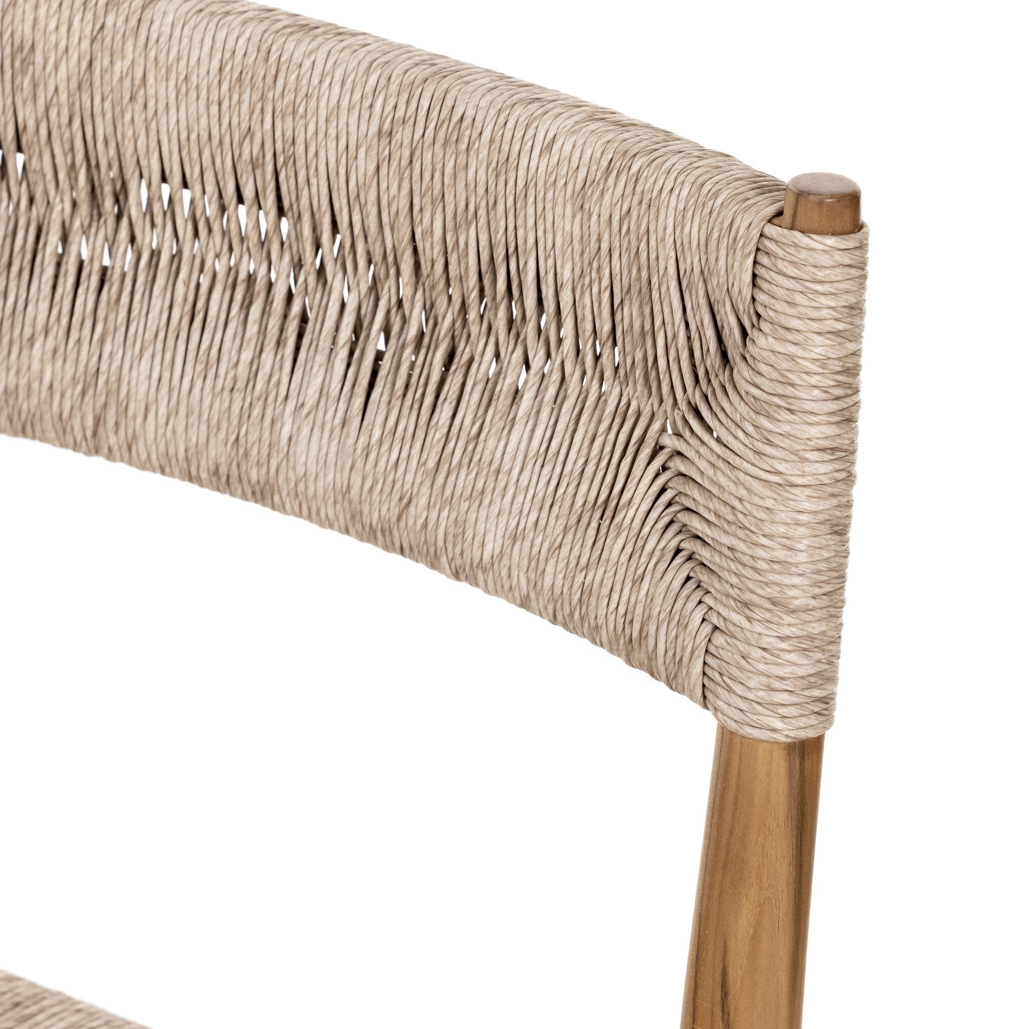 Close-up detail Lomas Outdoor Dining Chair in Vintage White woven wicker with a tapered natural teak frame