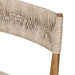 Close-up detail Lomas Outdoor Dining Chair in Vintage White woven wicker with a tapered natural teak frame