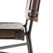 Close-up detail Wharton Counter Stool featuring Distressed Brown faux leather and industrial steel legs