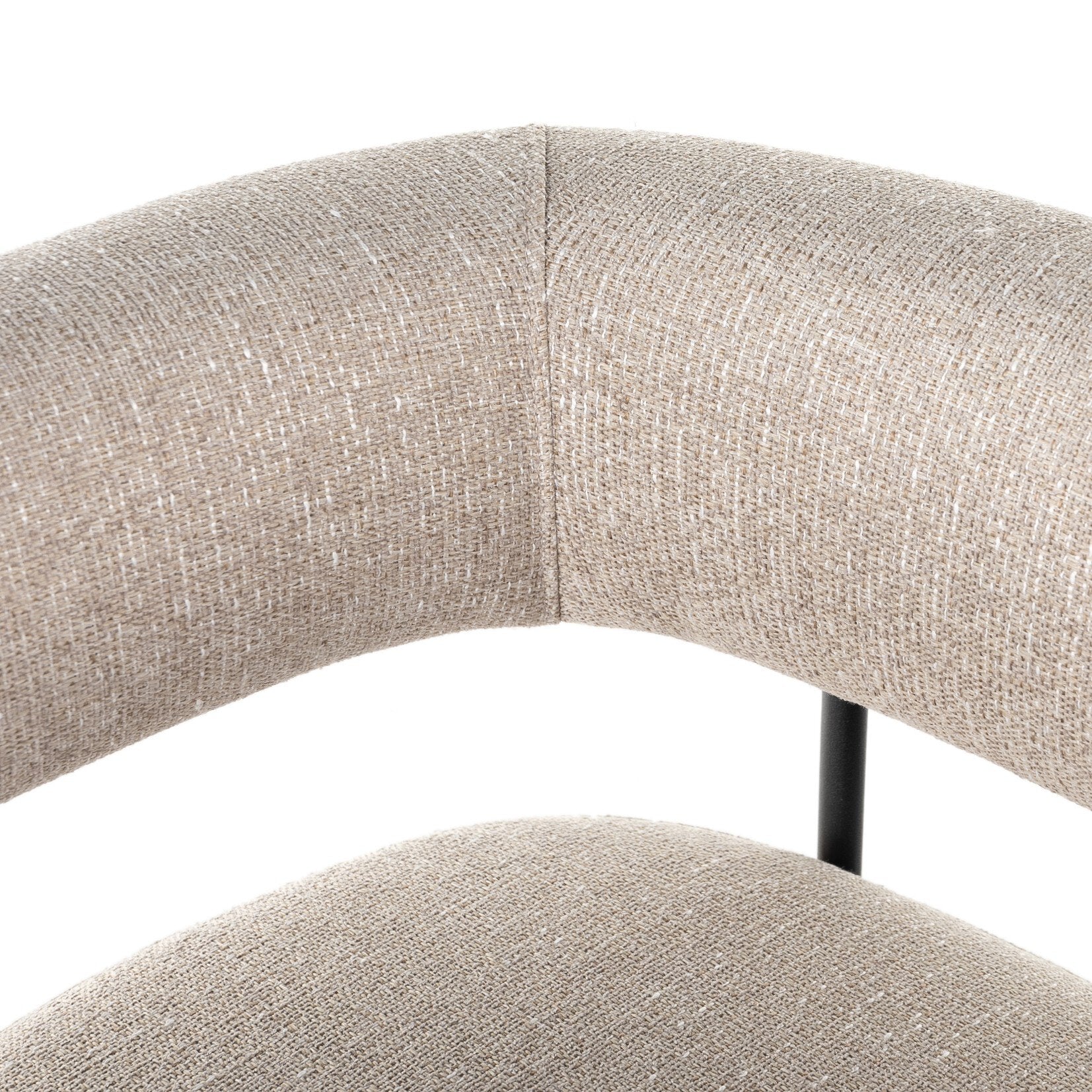 Close-up of light camel upholstered backrest and seat curve on counter stool