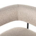 Close-up of light camel upholstered backrest and seat curve on counter stool