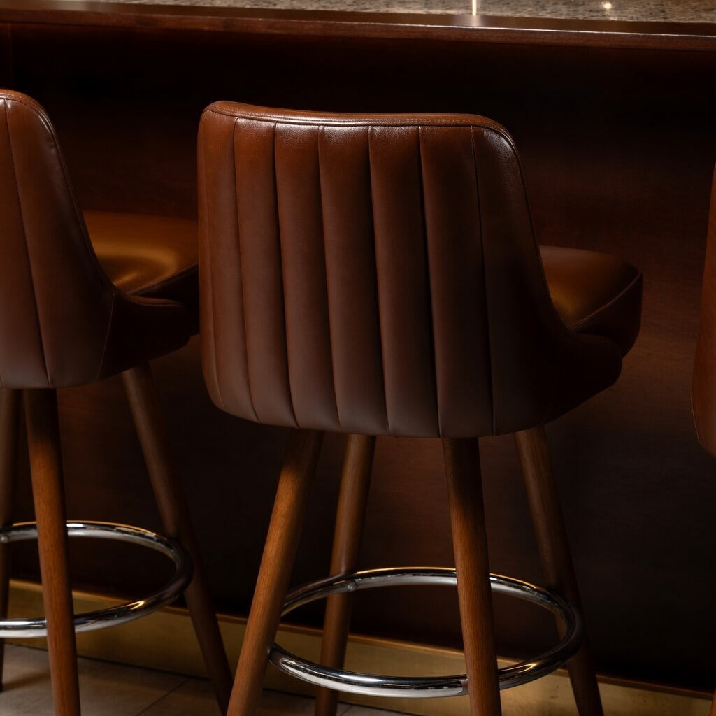 Close-up of the Delano's vertical channel tufting and premium performance upholstery designed for architectural depth