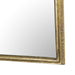 Close-up of the Loire mirror's aged texture on the gold leaf frame showing the corner bottom detail