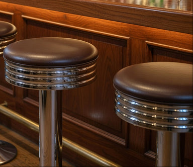Close-up of the Wentworth's heavy-duty bolted base and slim modern seat designed for busy commercial environments