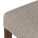 Armless dining chair seat cushion close-up in beige woven fabric with rounded edge