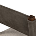 Armless dining chair backrest close-up with dark leather-look panel and wood corner cap