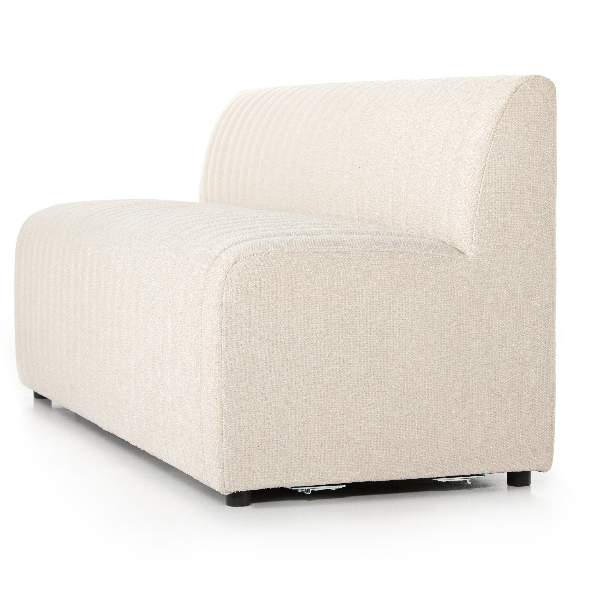 Close angled Custom Augustine dining banquette in neutral performance fabric with high-back tufted detailing and wood base.