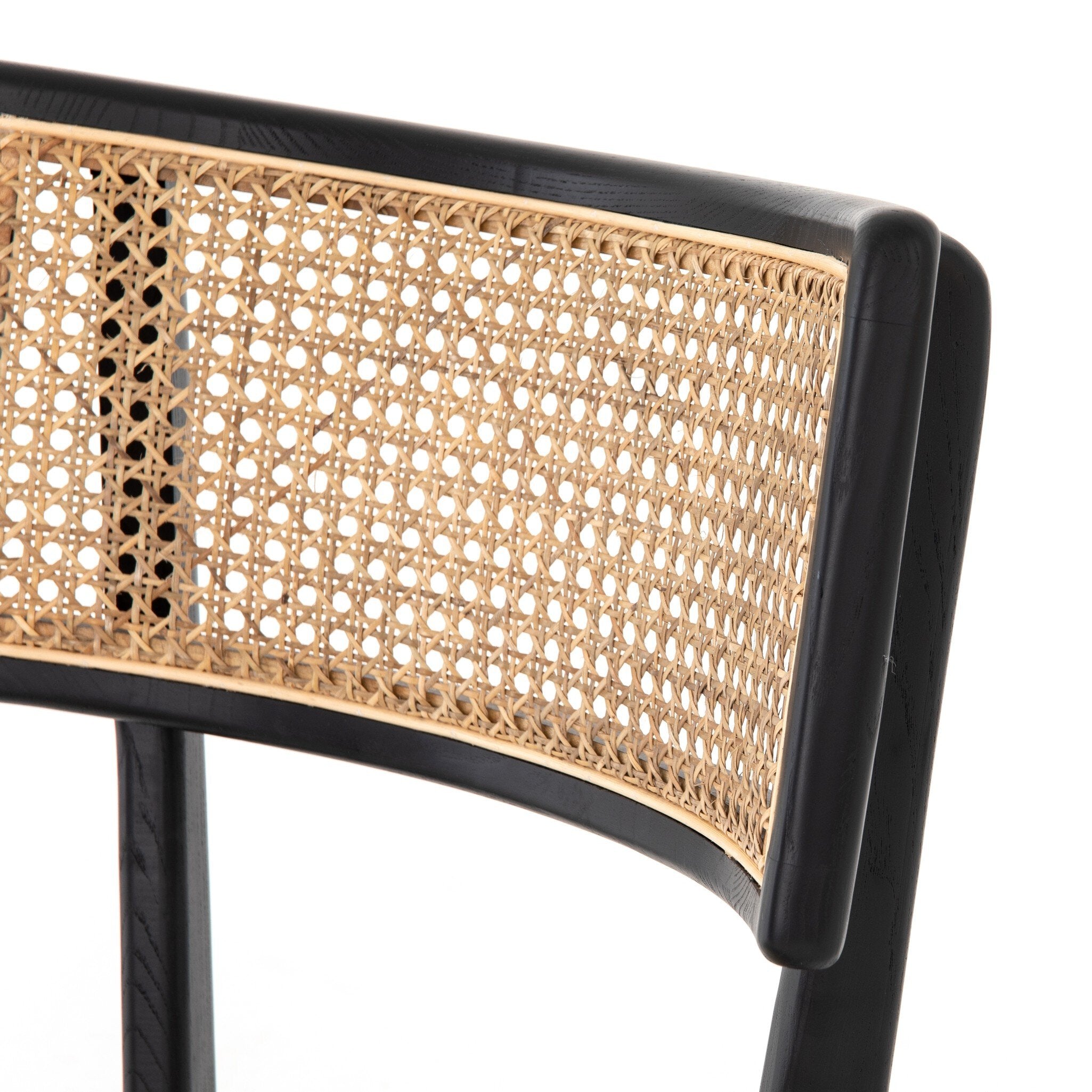 Close detail Britt Dining Chair in Cambric Ivory performance fabric with black parawood tapered legs