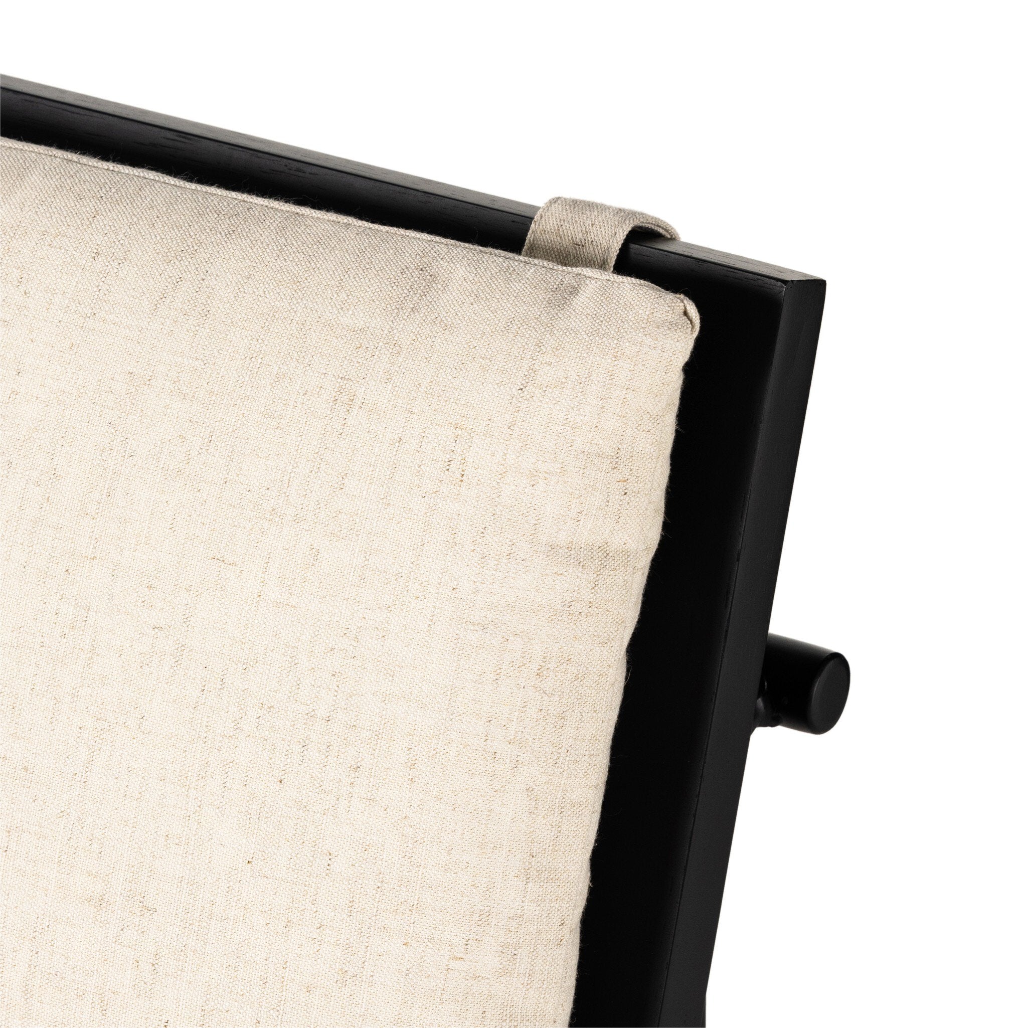 Close detail Crete Dining Chair with amber oak ladderback, black iron frame