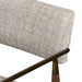 Close detail Fabric Waldon Dining Chair in Toasted Ash with textured ivory upholstery and an architectural wood frame