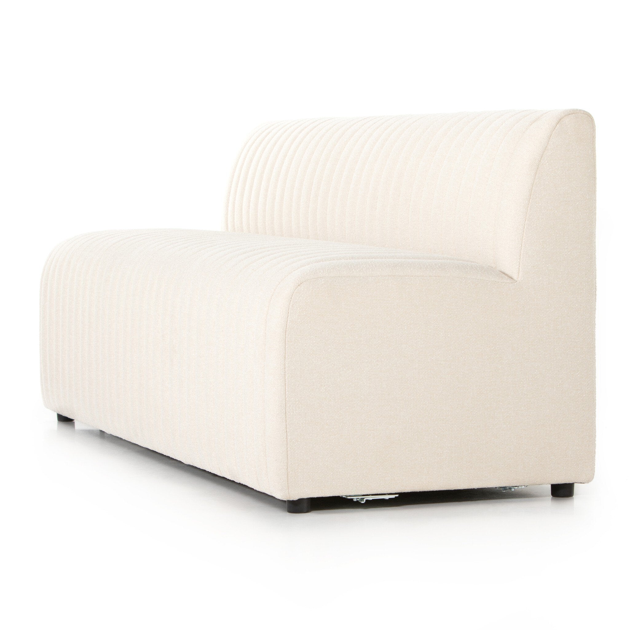 Close side Custom Augustine dining banquette in neutral performance fabric with high-back tufted detailing and wood base.