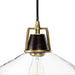 Close up brass Novak 10-inch hand-hammered antique brass pendant light with clear glass detail 
