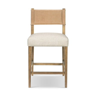 Contract grade Ferris beige counter stool with a wood frame and fabric seat, designed for high-performance fabric with a leather backing.