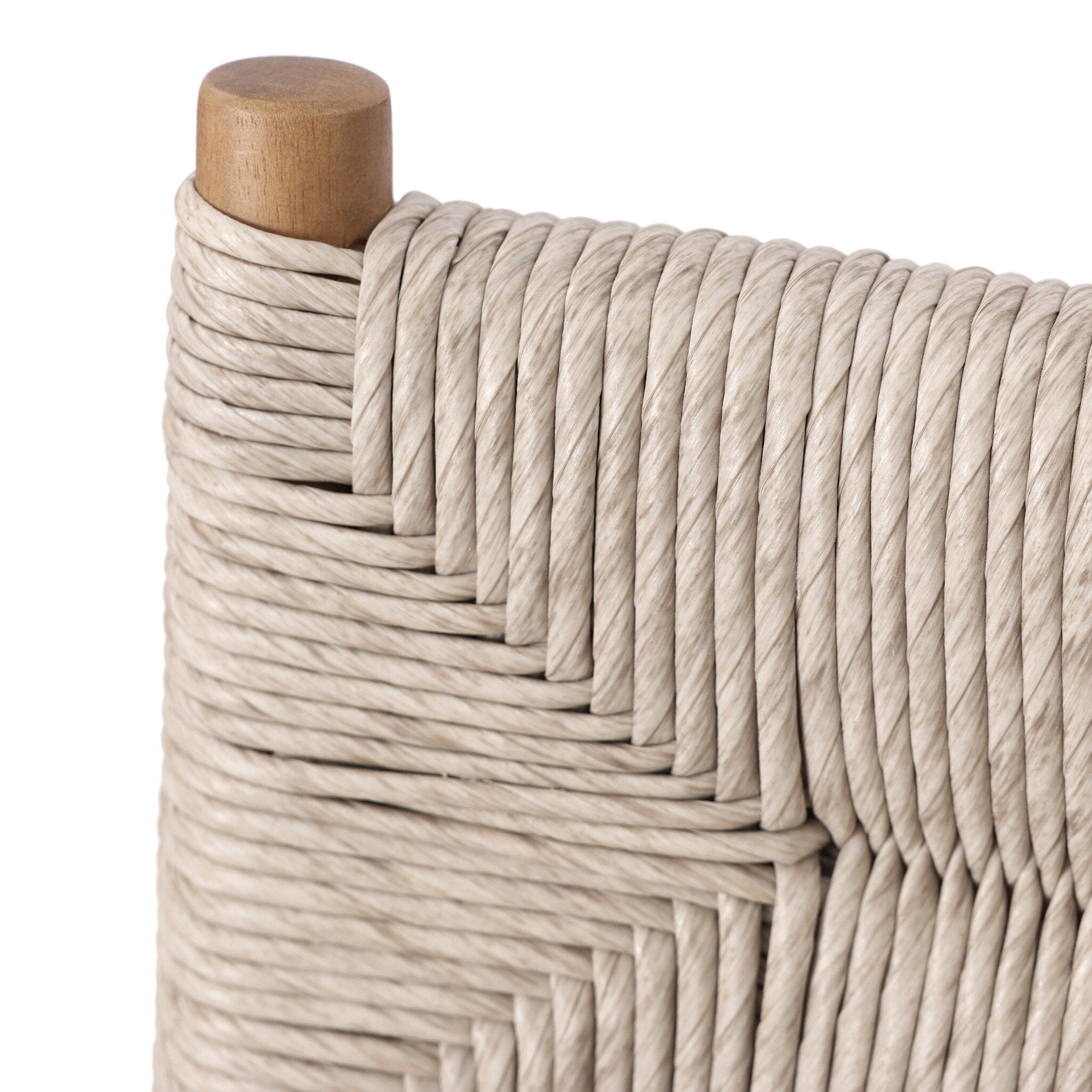 Vintage white woven cord backrest detail with rounded wood post on bar stool