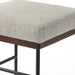 Stool with gray cushioned seat and wooden frame on a white background. Corner chair cushion and wood detail Benton Dining Chair in Savile Flannel performance fabric featuring a slim iron frame and wood bar.