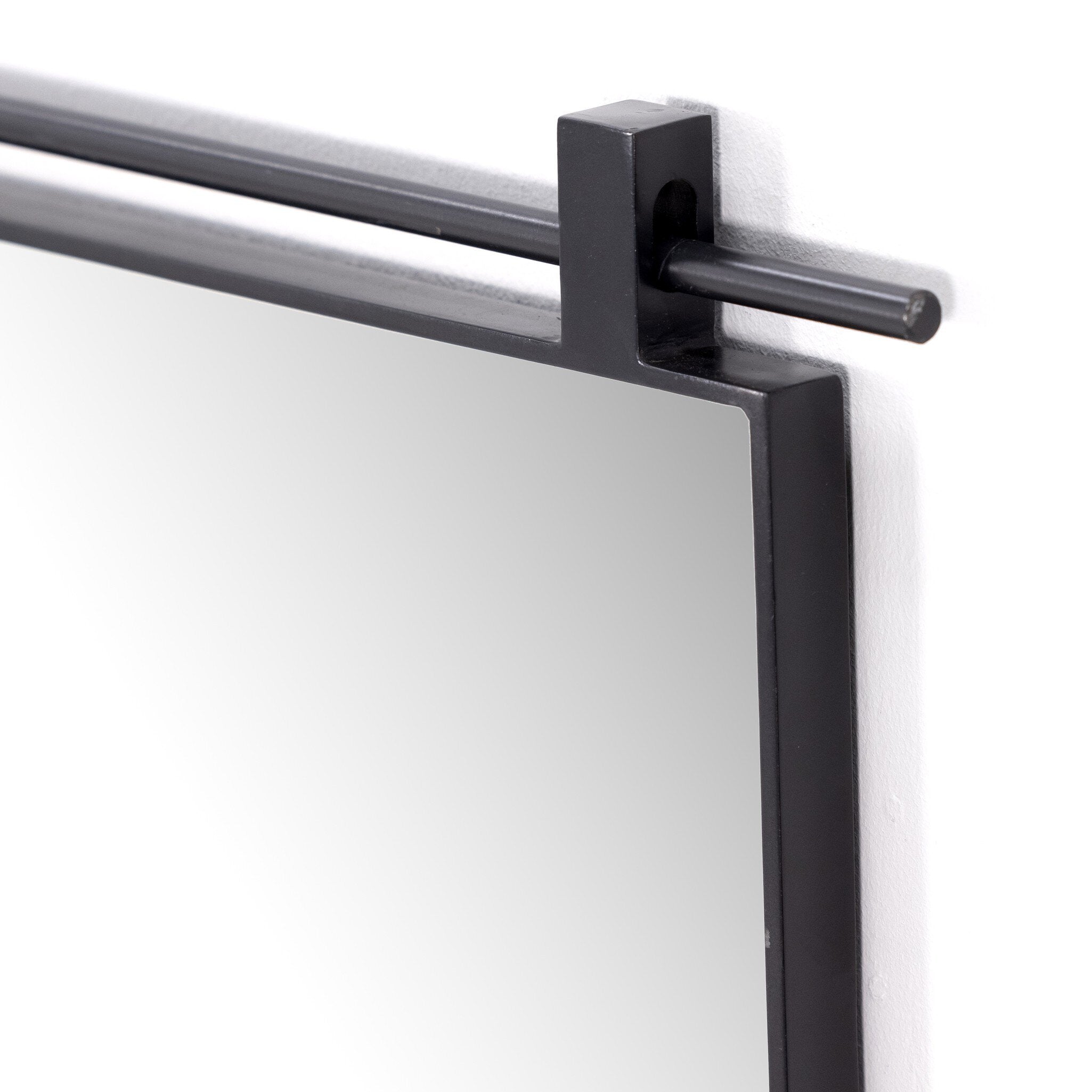 Corner angle detail Chico small square wall mirror with a vertical antique iron suspension bar