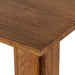 Corner close view Erie Bar Table in Smoked Oak with a chunky pedestal base and modern rustic design