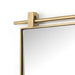 Corner detail Chico small arch wall mirror with a vertical antiqued brass suspension bar