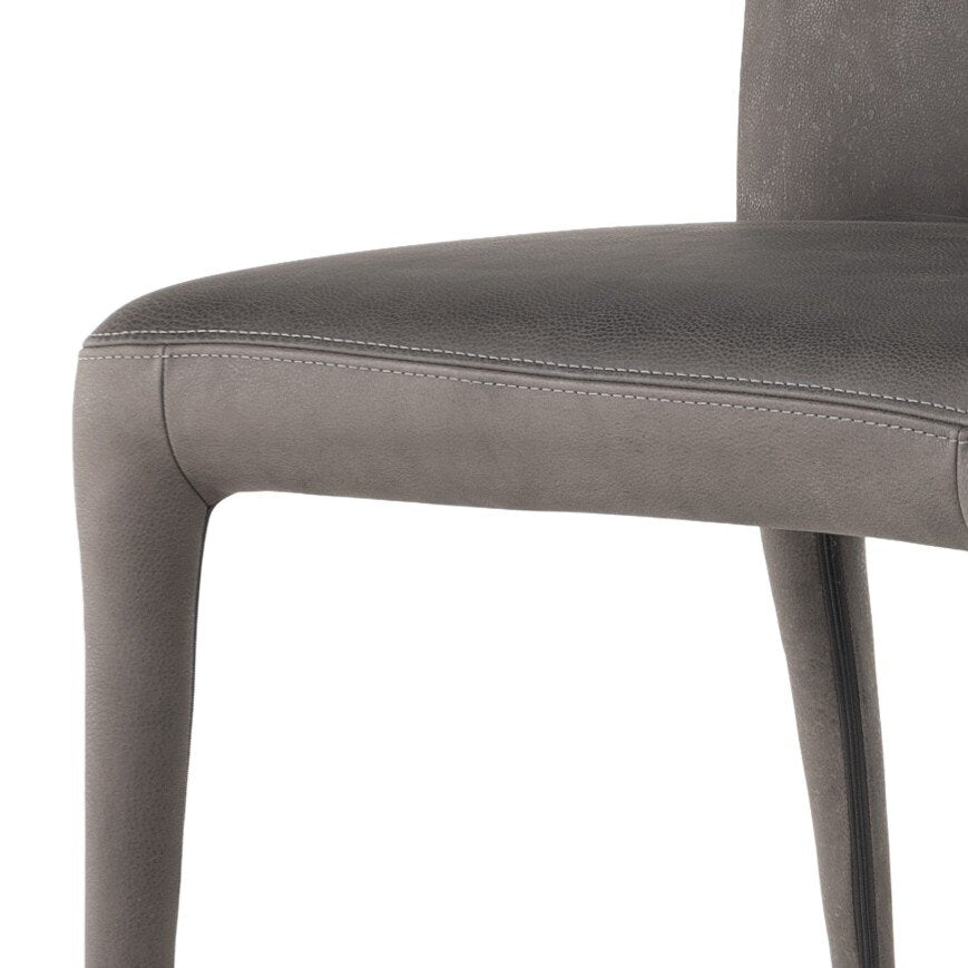 Corner leg performance fabric detail sleek gray dining chair with a scooped backrest and tapered legs, upholstered in top-grain leather.