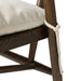 Cream seat cushion tied with fabric cord on brown wooden legs