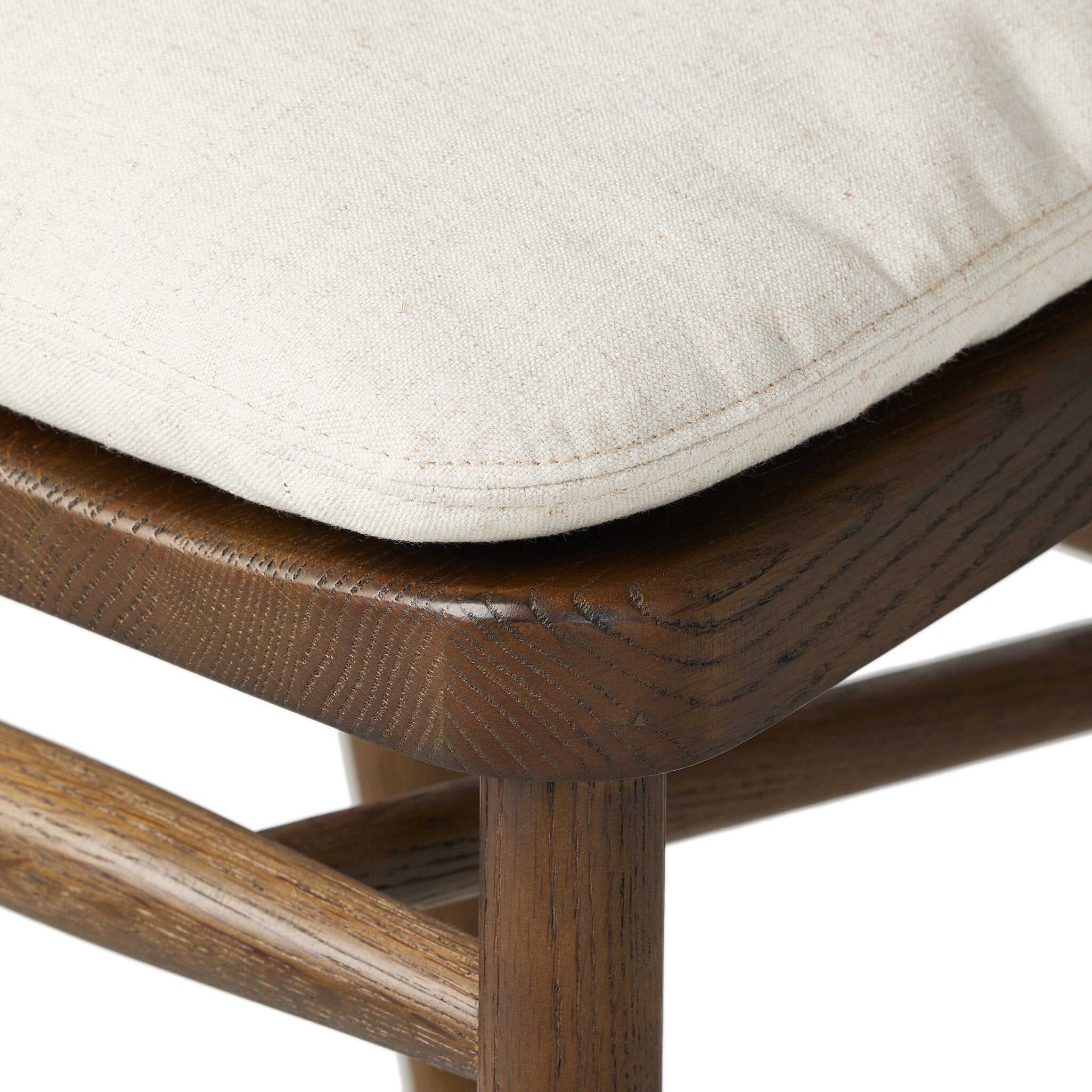 Cushion corner detail Buxton Bar Counter Stool in solid ash with a hand-wrapped paper rush backrest