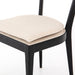 Cushion detail Britt Dining Chair in Cambric Ivory performance fabric with black parawood tapered legs