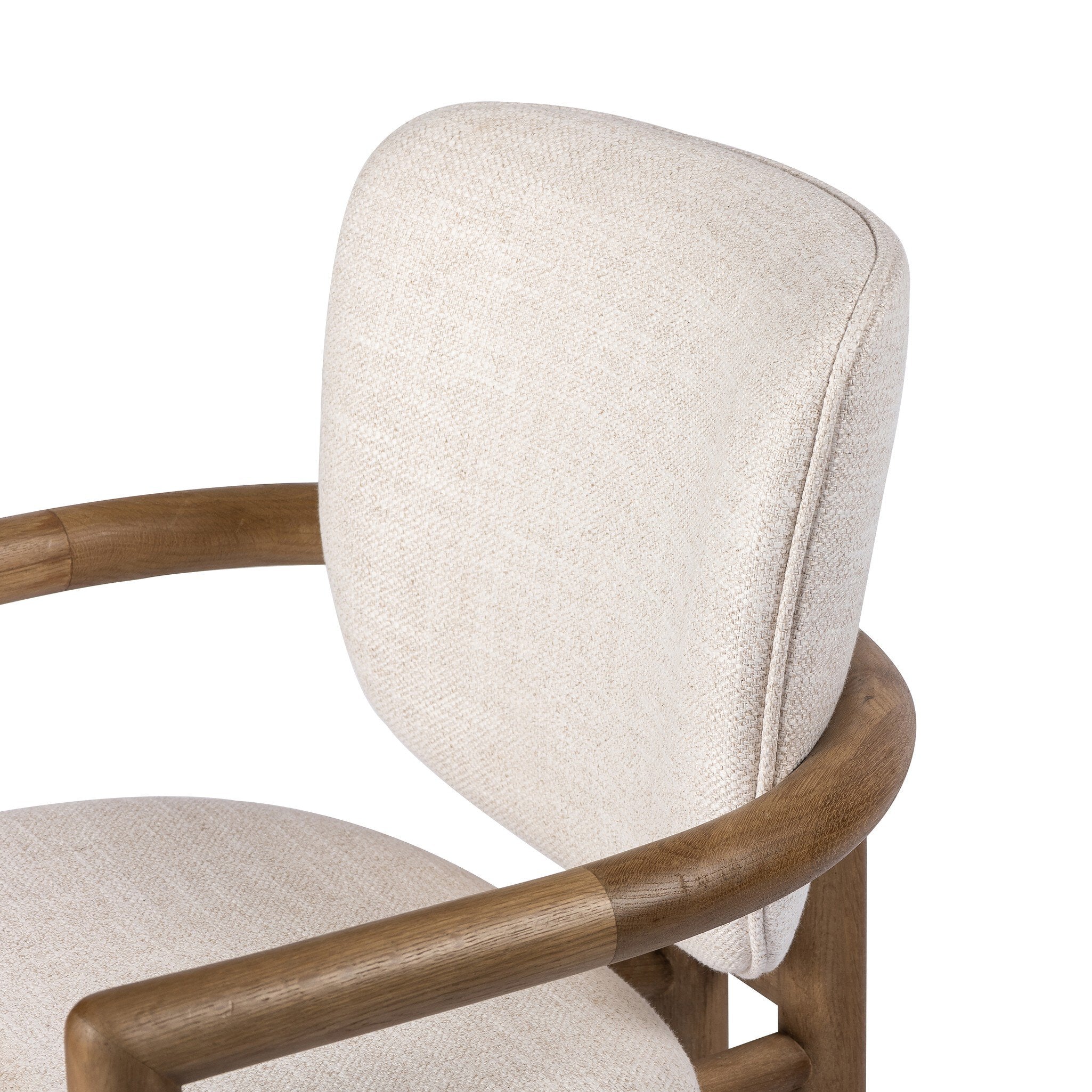 Cushion detail Madeira three-legged dining chair featuring a tubular frame and a curved barrel backrest in cream upholstery