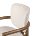 Cushion detail Madeira three-legged dining chair featuring a tubular frame and a curved barrel backrest in cream upholstery